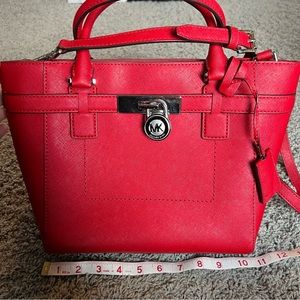 red michael kors purse